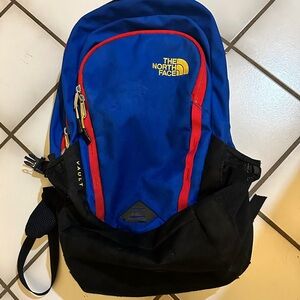 The North Face Blue and Black Backpack with Red Accents